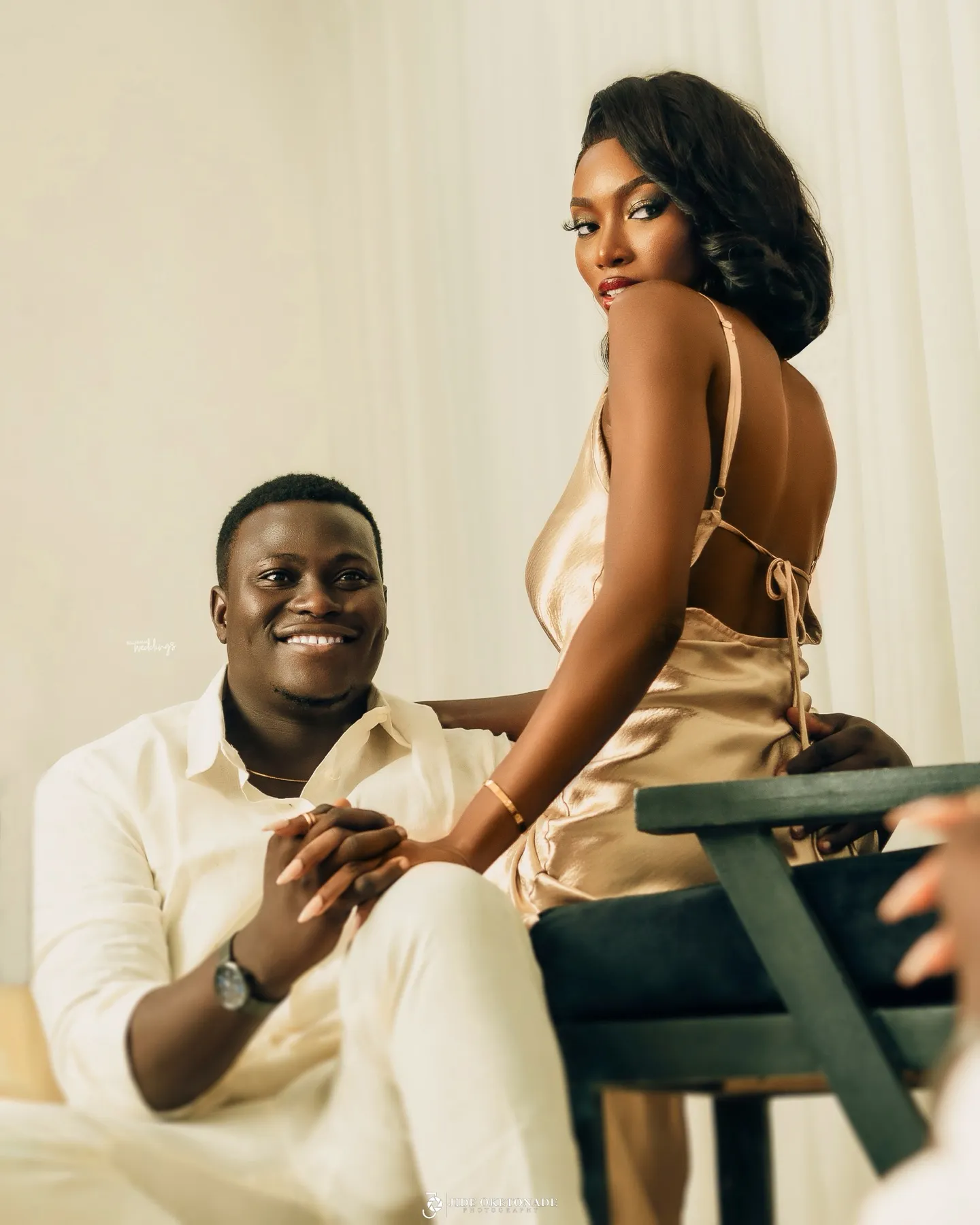 Deji smiling up at Esther