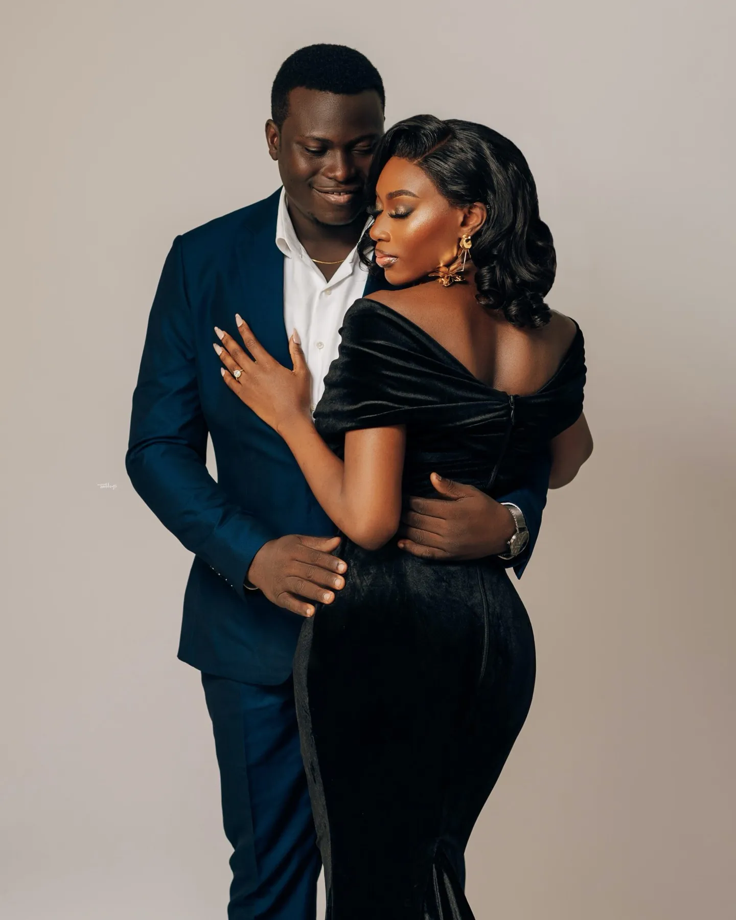 Esther and Deji in navy and black velvet