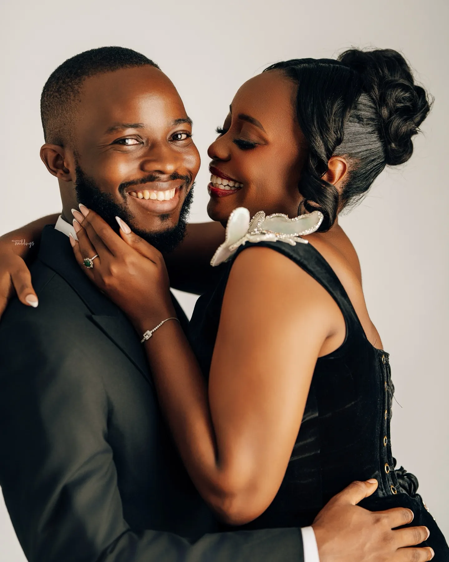 Hilda and Abraham smiling close together
