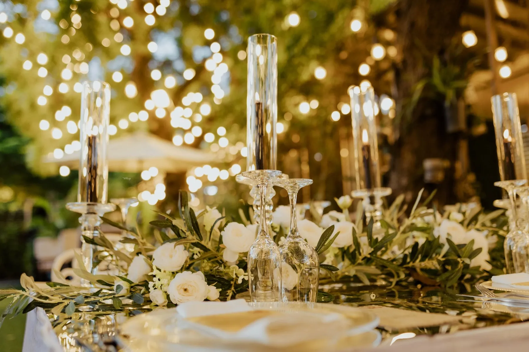 Candles and glassware on the dinner table