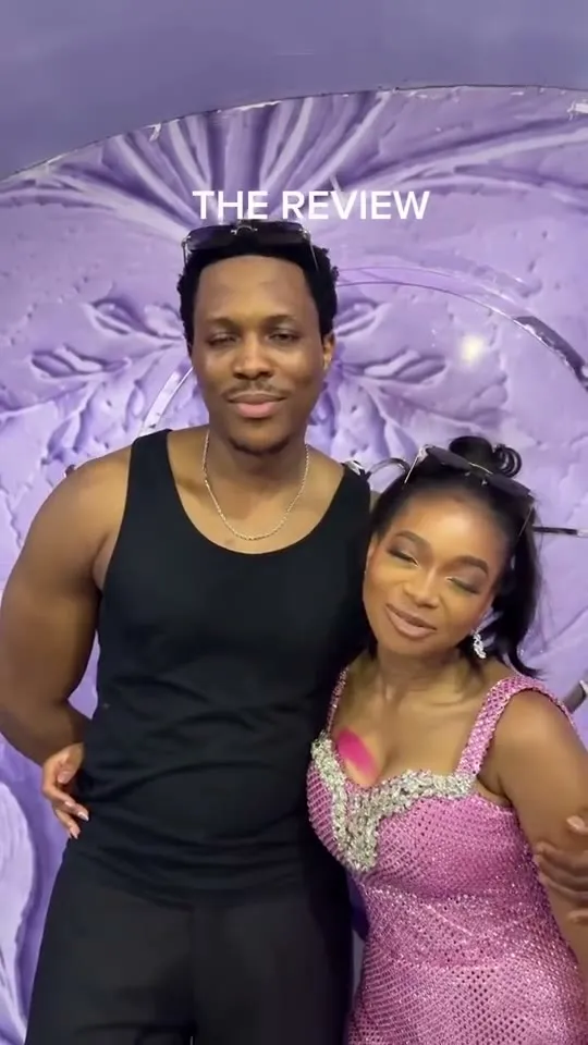 Esther and Tobi giving their review against a lilac backdrop