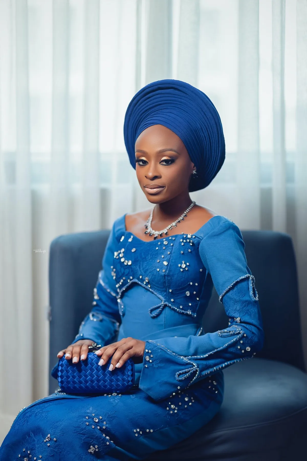 Lade seated in blue